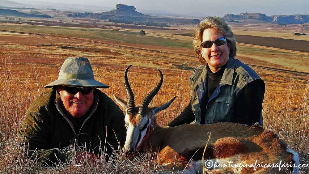Springbok hunting South Africa calibers Medical Doctor and husband with trophy Springbok ram, Eastern Free State, taken with a single shot from a .308 Tikka.