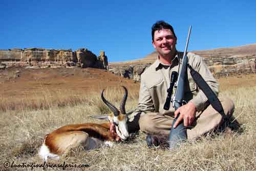 Springbok hunting South Africa Australian hunter Les with Trophy Springbok ram, Eastern Free State, taken on a successful scale-and-shoot hunt with a 30-06 slug.