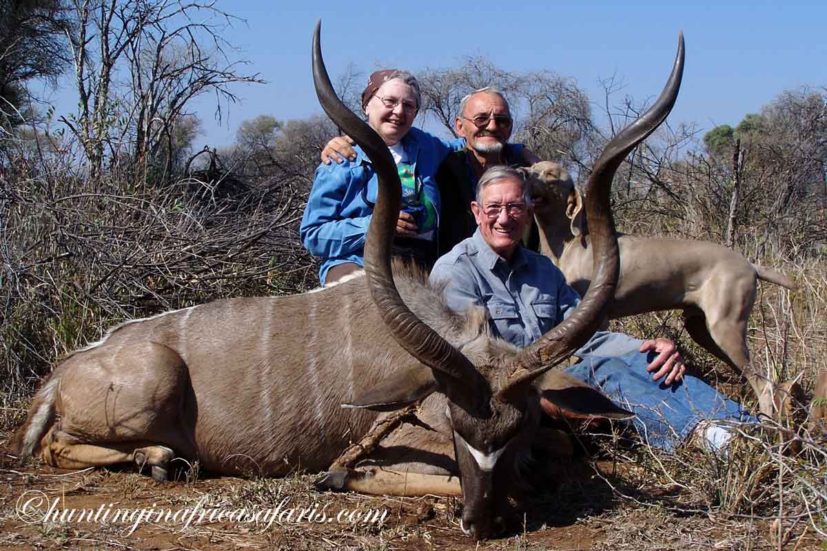 Hunting rifle resting on shooting sticks ready for a bushveld kudu hunt